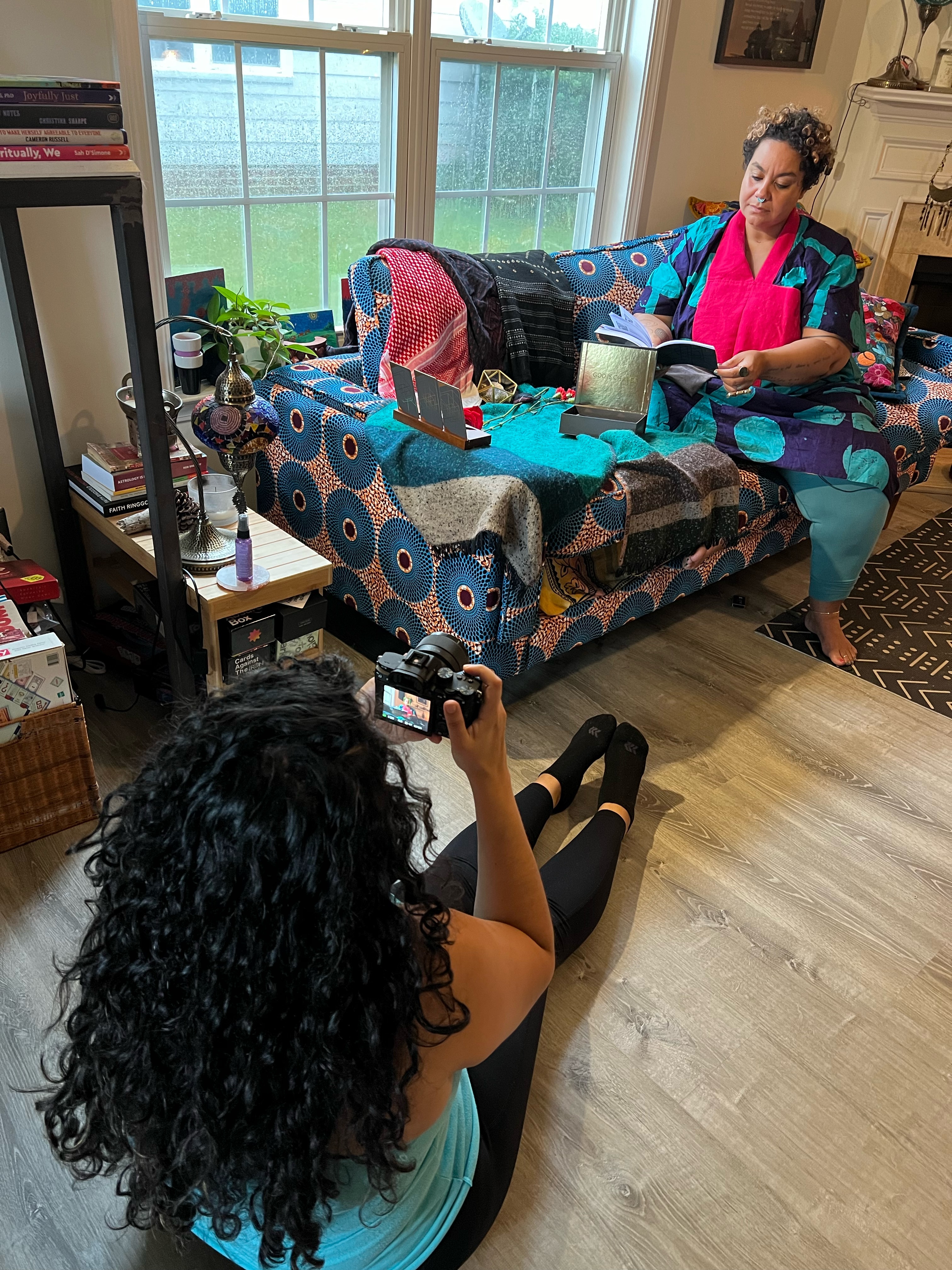 Sufia photographing a tarot reading